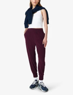 Sweaty Betty Repose Luxe 27 Stretch-fleece Jogging Bottoms 8 Sweaty Betty Repose Luxe 27 Stretch-fleece Jogging Bottoms -Sweaty Bety Clothing Shop R04074876 PLUMRED ALT01