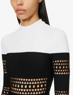 ALAIA Cut-out Flared-hem Stretch-woven Mini Dress -Sweaty Bety Clothing Shop R04076420 NOIRBLANC ALT04