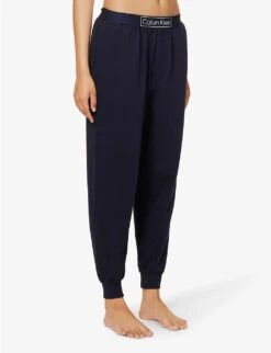 Calvin Klein Reimagined Heritage Logo-band Cotton And Recycled-polyester-blend Jogging Bottoms 9 Calvin Klein Reimagined Heritage Logo-band Cotton And Recycled-polyester-blend Jogging Bottoms -Sweaty Bety Clothing Shop R04097699 NIGHTSKY ALT02