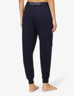 Calvin Klein Reimagined Heritage Logo-band Cotton And Recycled-polyester-blend Jogging Bottoms 10 Calvin Klein Reimagined Heritage Logo-band Cotton And Recycled-polyester-blend Jogging Bottoms -Sweaty Bety Clothing Shop R04097699 NIGHTSKY ALT03