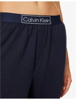 Calvin Klein Reimagined Heritage Logo-band Cotton And Recycled-polyester-blend Jogging Bottoms 11 Calvin Klein Reimagined Heritage Logo-band Cotton And Recycled-polyester-blend Jogging Bottoms -Sweaty Bety Clothing Shop R04097699 NIGHTSKY ALT04